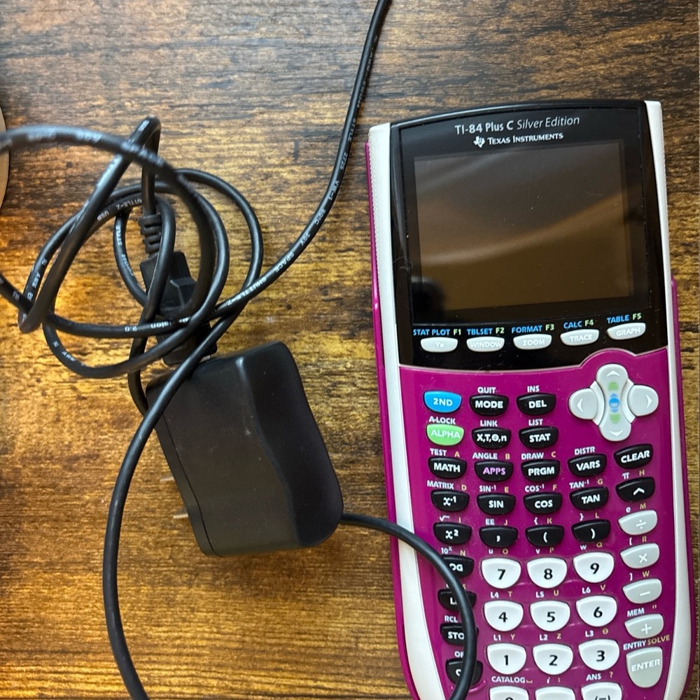 Texas Instruments TI-84 Plus Silver Edition Graphing Calculator - Plum Purple